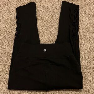 Lululemon Tied to It Crop Black Leggings Size 4 (S) with cross cross mesh detail